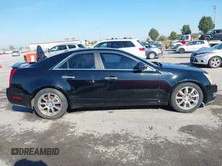 2008 Cadillac CTS AWD w/1SB with VIN 1G6DT57V280213375, listed as a IAAI auction lot 40646045 with 125,835 mi miles. Bid and sale history available at carsss.com. Image 13.