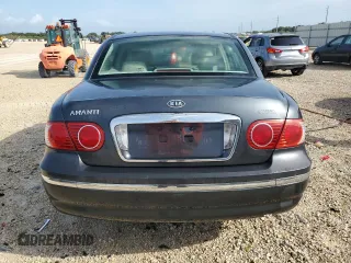 2004 Kia Amanti z VIN KNALD124845031347, wystawiony jako Copart lot #73089774 z przebiegiem 139 545 mil mil oraz Szkody całkowita. Historia ofert i sprzedaży dostępna na DreamBid. Obrazek 6.