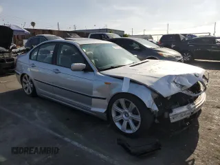 2002 BMW 3 Series 325i with VIN WBAEV33472KL73547, listed as a Copart auction lot 57667895 with 350,318 mi miles and Salvage title. Bid and sale history available at DreamBid. Image 4.