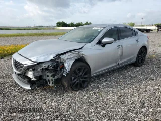 2016 Mazda 6 i Grand Touring с VIN JM1GJ1W53G1434499, выставлен на аукционе Copart как лот 54739745 с пробегом Не указан миль и Списание • Salvage title. История ставок и продаж доступна на DreamBid. Изображение 1.