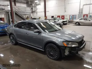 2015 Volkswagen Passat 2.0L TDI SE w/Sunroof with VIN 1VWBV7A3XFC094226, listed as a IAAI auction lot 41838239 with 169,737 mi miles. Bid and sale history available at carsss.com. Image 1.