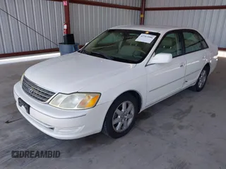 2003 Toyota Avalon XL z VIN 4T1BF28B03U307816, wystawiony jako IAAI lot #42313586 z przebiegiem 199 393 mil mil oraz . Historia ofert i sprzedaży dostępna na DreamBid. Obrazek 2.