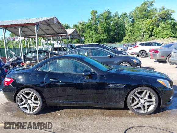2014 Mercedes-Benz SLK 250 с VIN WDDPK4HAXEF083492, выставлен на аукционе IAAI как лот 42289662 с пробегом 100 118 миль миль и . История ставок и продаж доступна на DreamBid. Изображение 13.