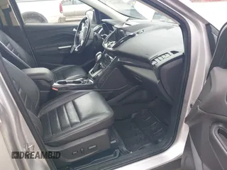 2016 Ford Escape Titanium with VIN 1FMCU9JX3GUC86930, listed as a IAAI auction lot 42582263 with 113,386 mi miles and . Bid and sale history available at DreamBid. Image 5.
