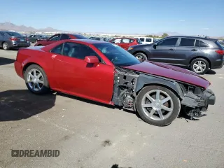 2004 Cadillac XLR z VIN 1G6YV34A345600127, wystawiony jako Copart lot #68859774 z przebiegiem 40 727 mil mil oraz Szkody całkowita. Historia ofert i sprzedaży dostępna na DreamBid. Obrazek 4.