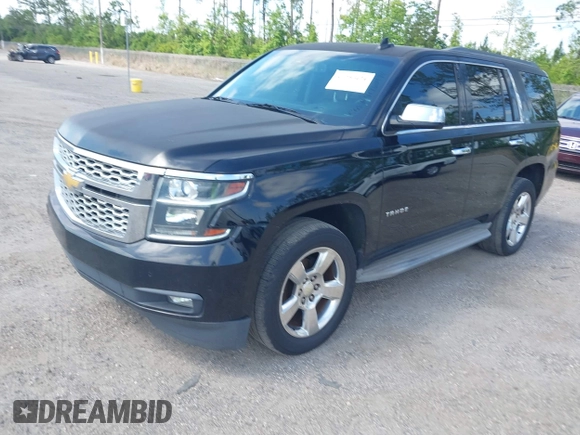 2015 Chevrolet Tahoe LT with VIN 1GNSCBKC1FR615817, listed as a IAAI auction lot 41760474 with 242,148 mi miles and . Bid and sale history available at DreamBid. Image 17.