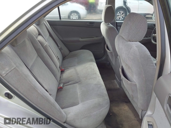 2004 Toyota Camry LE with VIN 4T1BE32K84U374943, listed as a IAAI auction lot 42038382 with 323,419 mi miles. Bid and sale history available at carsss.com. Image 8.