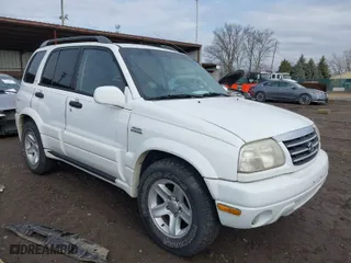 2001 Suzuki Grand Vitara JLX with VIN JS3TD62V114157738, listed as a IAAI auction lot 41721813 with 134,661 mi miles. Bid and sale history available at carsss.com. Image 1.