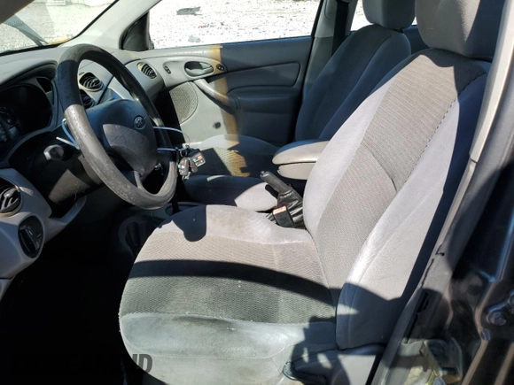 2004 Ford Focus SE with VIN 1FAFP34304W165468, listed as a Copart auction lot 45719985 with 208,259 mi miles and Salvage title. Bid and sale history available at DreamBid. Image 7.