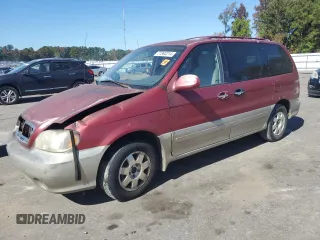 2003 Kia Sedona LX with VIN KNDUP131636364111, listed as a Copart auction lot 77393214 with 0 mi miles and Salvage Title. Bid and sale history available at carsss.com. Image 1.