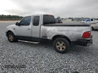2000 Ford F-150 XL z VIN 2FTRX07L1YCA33404, wystawiony jako Copart lot #51214145 z przebiegiem Nie podano mil oraz Szkoda całkowita • Salvage title. Historia ofert i sprzedaży dostępna na DreamBid. Obrazek 2.