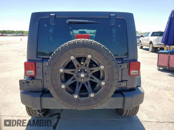2013 Jeep Wrangler Unlimited Sport with VIN 1C4HJWDG2DL620654, listed as a Copart auction lot 52704645 with 133,932 mi miles and Clean title. Bid and sale history available at DreamBid. Image 6.