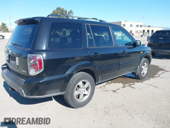 2007 Honda Pilot EX-L with VIN 5FNYF185X7B016807, listed as a IAAI auction lot 41759785 with 129,690 mi miles. Bid and sale history available at carsss.com. Image 4.