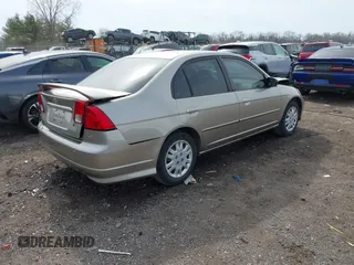 2004 Honda Civic LX with VIN 1HGES16564L001099, listed as a IAAI auction lot 41830582 with 157,151 mi miles. Bid and sale history available at carsss.com. Image 4.