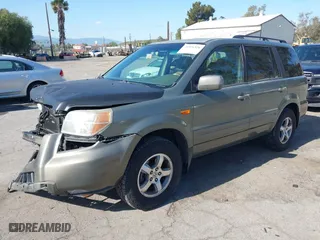 2007 Honda Pilot EX-L with VIN 5FNYF28727B041336, listed as a IAAI auction lot 41926326 with 102,927 mi miles. Bid and sale history available at carsss.com. Image 2.