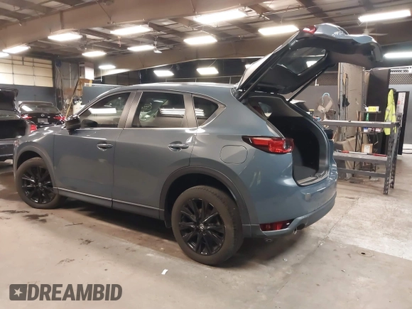 2021 Mazda CX-5 Touring with VIN JM3KFBCM5M0394707, listed as a IAAI auction lot 41887973 with 44,670 mi miles. Bid and sale history available at carsss.com. Image 3.