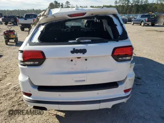 2018 Jeep Grand Cherokee High Altitude with VIN 1C4RJECG1JC125602, listed as a Copart auction lot 88702275 with 59,701 mi miles and Salvage title. Bid and sale history available at DreamBid. Image 6.