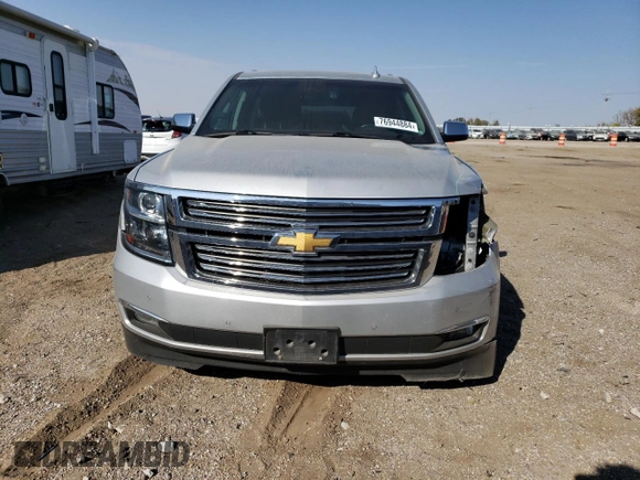 2017 Chevrolet Suburban Premier with VIN 1GNSKJKC4HR316953, listed as a Copart auction lot 76944884 with 105,753 mi miles and Salvage Title. Bid and sale history available at DreamBid. Image 5.