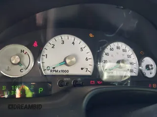 2004 Ford Thunderbird Deluxe with VIN 1FAHP60A84Y100984, listed as a IAAI auction lot 40978553 with 113,051 mi miles. Bid and sale history available at carsss.com. Image 7.