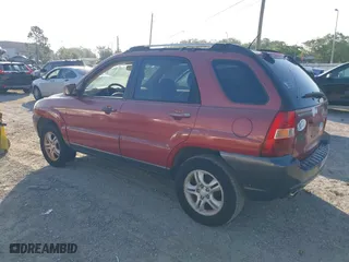 2005 Kia Sportage LX with VIN KNDJF723457078461, listed as a IAAI auction lot 41948080 with 104,330 mi miles. Bid and sale history available at carsss.com. Image 3.