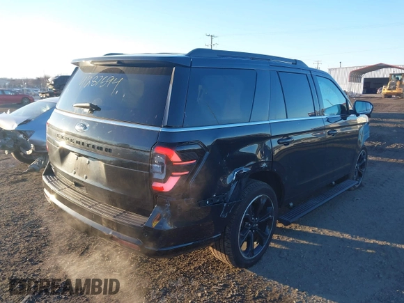 2023 Ford Expedition Limited with VIN 1FMJU2A89PEA48856, listed as a IAAI auction lot 41287594 with 13,891 mi miles. Bid and sale history available at carsss.com. Image 4.