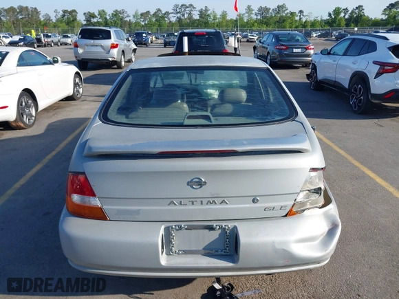 1999 Nissan Altima XE with VIN 1N4DL01D4XC252973, listed as a IAAI auction lot 42005504 with 247,570 mi miles. Bid and sale history available at carsss.com. Image 15.