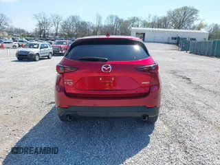 2022 Mazda CX-5 2.5 S Premium Package with VIN JM3KFBDM5N1532837, listed as a IAAI auction lot 41869721 with 59,249 mi miles. Bid and sale history available at carsss.com. Image 16.