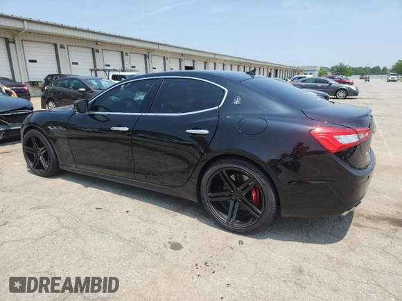 2014 Maserati Ghibli S Q4 with VIN ZAM57RTA5E1122165, listed as a Copart auction lot 60257835 with Not provided miles and Salvage title. Bid and sale history available at DreamBid. Image 2.