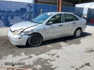 2004 Ford Focus SE with VIN 1FAFP34374W158243, listed as a Copart auction lot 58779745 with 277,627 mi miles and Salvage title. Bid and sale history available at DreamBid. Image 1.