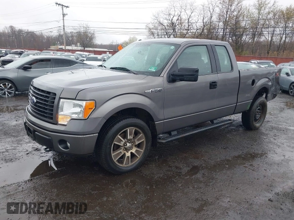 2014 Ford F-150 XL with VIN 1FTFX1EF8EFA97820, listed as a IAAI auction lot 41974347 with 148,018 mi miles. Bid and sale history available at carsss.com. Image 2.