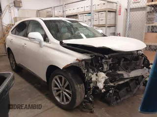 2015 Lexus RX 450h with VIN 2T2ZB1BA0FC003410, listed as a IAAI auction lot 41548839 with 89,742 mi miles and . Bid and sale history available at DreamBid. Image 1.