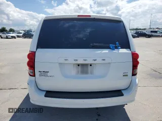 2014 Dodge Grand Caravan SXT z VIN 2C4RDGCG8ER428893, wystawiony jako Copart lot #56671355 z przebiegiem 261 815 mil mil oraz Szkoda całkowita • Salvage title. Historia ofert i sprzedaży dostępna na DreamBid. Obrazek 6.