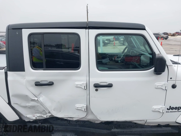 2021 Jeep Gladiator Willys with VIN 1C6HJTAG1ML575474, listed as a IAAI auction lot 41439898 with 44,335 mi miles and . Bid and sale history available at DreamBid. Image 14.