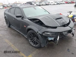 2022 Dodge Charger Scat Pack Widebody with VIN 2C3CDXGJ4NH159524, listed as a IAAI auction lot 41506983 with 66,750 mi miles and . Bid and sale history available at carsss.com. Image 1.