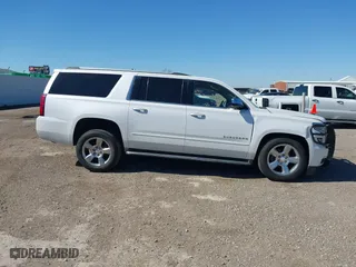 2017 Chevrolet Suburban Premier with VIN 1GNSCJKC7HR142082, listed as a IAAI auction lot 41749026 with 152,415 mi miles. Bid and sale history available at carsss.com. Image 13.