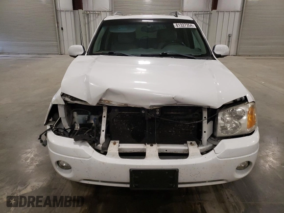 2009 GMC Envoy SLT with VIN 1GKDT43S492124405, listed as a Copart auction lot 81337354 with 154,045 mi miles and Salvage Title. Bid and sale history available at carsss.com. Image 5.