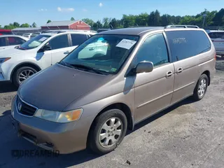 2003 Honda Odyssey EX z VIN 5FNRL18633B122838, wystawiony jako IAAI lot #42287776 z przebiegiem 130 544 mil mil oraz . Historia ofert i sprzedaży dostępna na DreamBid. Obrazek 2.