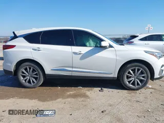 2020 Acura RDX Technology with VIN 5J8TC1H59LL011089, listed as a IAAI auction lot 41246036 with 66,261 mi miles and . Bid and sale history available at DreamBid. Image 13.