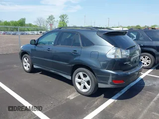 2007 Lexus RX with VIN 2T2GK31U07C021695, listed as a IAAI auction lot 42032252 with 146,023 mi miles. Bid and sale history available at carsss.com. Image 3.