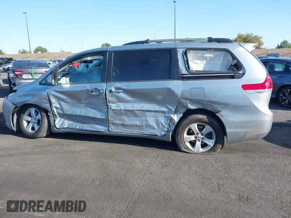 2014 Toyota Sienna LE AAS with VIN 5TDKK3DC7ES435109, listed as a IAAI auction lot 41963135 with 175,517 mi miles and . Bid and sale history available at DreamBid. Image 6.