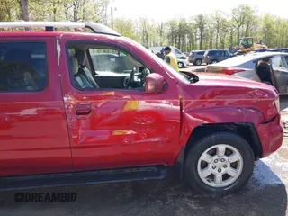 2006 Honda Ridgeline RTL with VIN 2HJYK16566H506602, listed as a IAAI auction lot 42098233 with 236,804 mi miles. Bid and sale history available at carsss.com. Image 6.