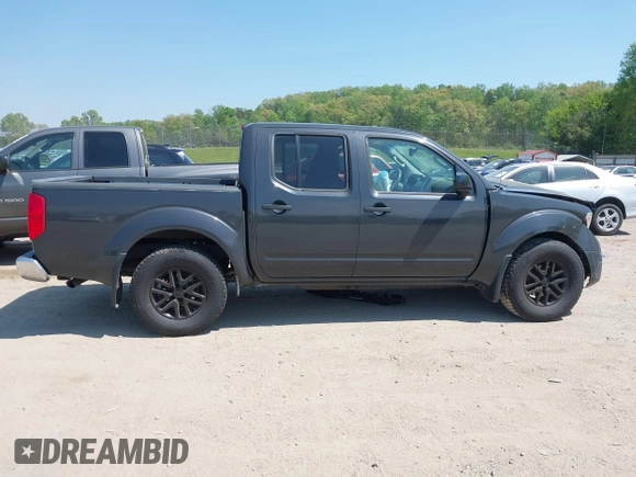 2014 Nissan Frontier SV with VIN 1N6AD0EV6EN729351, listed as a IAAI auction lot 42072768 with 149,158 mi miles and . Bid and sale history available at DreamBid. Image 13.