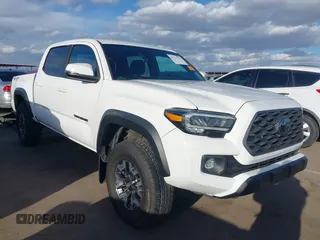 2021 Toyota Tacoma SR z VIN 3TMCZ5AN1MM448048, wystawiony jako IAAI lot #41713131 z przebiegiem 57 187 mil mil oraz . Historia ofert i sprzedaży dostępna na DreamBid. Obrazek 1.