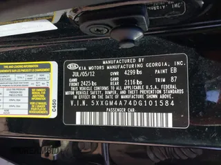 2013 Kia Optima LX with VIN 5XXGM4A74DG101584, listed as a IAAI auction lot 41835179 with 123,689 mi miles. Bid and sale history available at carsss.com. Image 9.