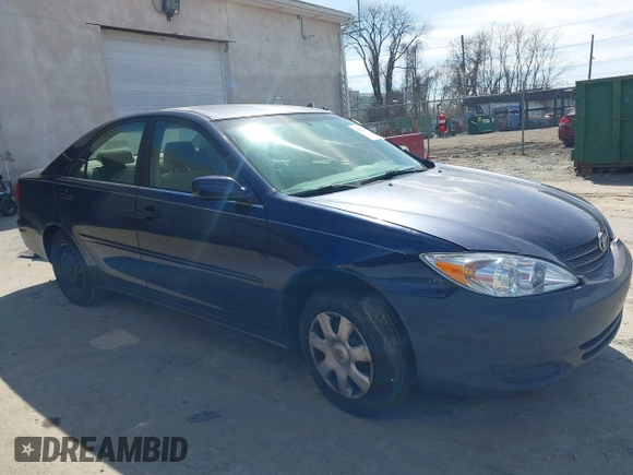 2002 Toyota Camry LE z VIN JTDBE32KX20111362, wystawiony jako IAAI lot #41820475 z przebiegiem 270 091 mil mil oraz . Historia ofert i sprzedaży dostępna na DreamBid. Obrazek 13.