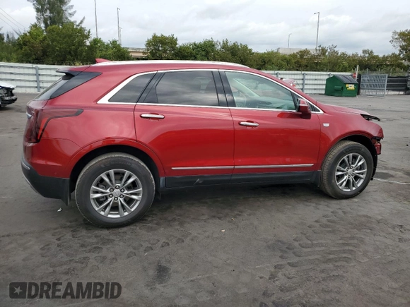 2021 Cadillac XT5 FWD Premium Luxury with VIN 1GYKNCRS7MZ149310, listed as a Copart auction lot 87937445 with 13,829 mi miles and Salvage Title. Bid and sale history available at DreamBid. Image 3.