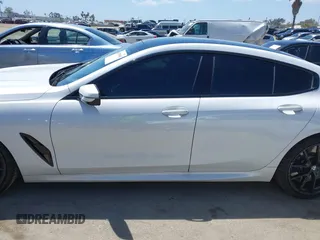 2022 BMW 8 Series M850i z VIN WBAGV8C02NCH87808, wystawiony jako IAAI lot #42255995 z przebiegiem 34 285 mil mil oraz . Historia ofert i sprzedaży dostępna na DreamBid. Obrazek 14.