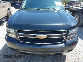 2011 Chevrolet Suburban LT with VIN 1GNSCJE09BR319675, listed as a IAAI auction lot 41966225 with 294,335 mi miles. Bid and sale history available at carsss.com. Image 12.