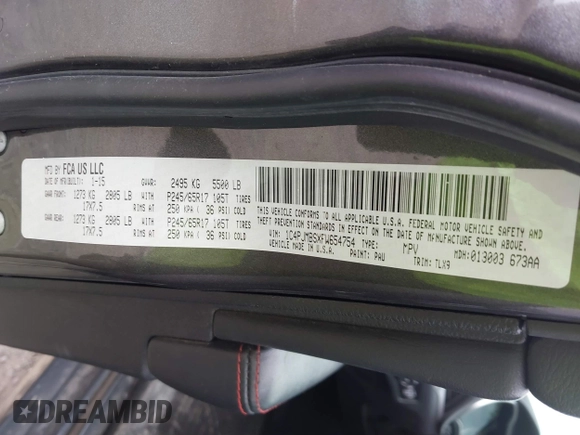 2015 Jeep Cherokee Trailhawk with VIN 1C4PJMBSXFW654754, listed as a IAAI auction lot 39935278 with 128,076 mi miles and . Bid and sale history available at DreamBid. Image 9.