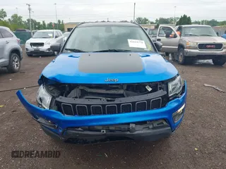 2019 Jeep Compass Trailhawk z VIN 3C4NJDDB6KT760638, wystawiony jako IAAI lot #42634778 z przebiegiem 88 965 mil mil oraz . Historia ofert i sprzedaży dostępna na DreamBid. Obrazek 12.